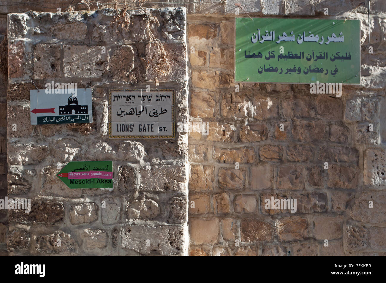 Jerusalem: signs to Lion's Gate and the Dome of the Rock in the Islamic Quarter Stock Photo