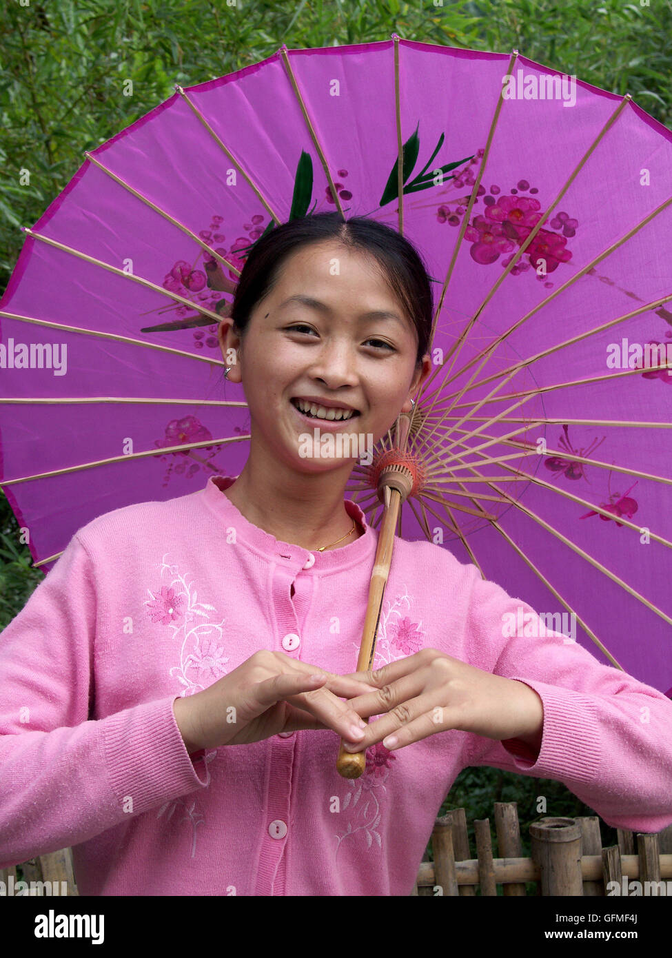 A Dai girl with parasol in the Chinese Ethnic Culture Park, Beijing