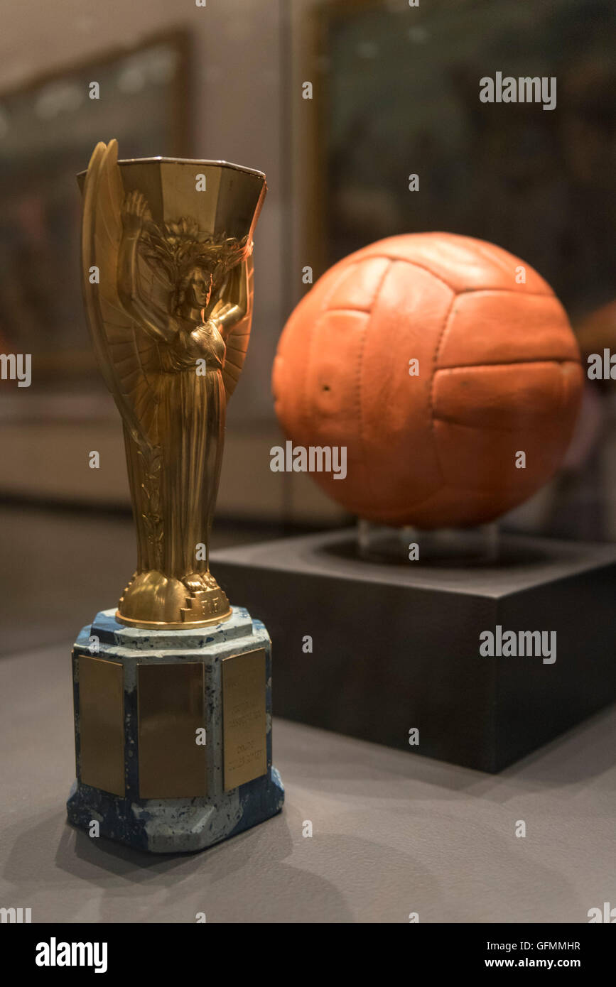 London, UK.  31 July 2016.  The actual match ball and duplicate Jules Rimet trophy on display for one day only at the Victoria and Albert museum as part of the 50th anniversary of England winning the 1966 World Cup final.  The trophy on display is the actual one that victorious players drank champagne out of.  Brazil went on to win the trophy outright allowing them to keep it, but when the original was stolen, this trophy became the only one to have been present at the Wembley final and was later purchased by FIFA in 1997 for GBP 254,500. Credit:  Stephen Chung / Alamy Live News Stock Photo