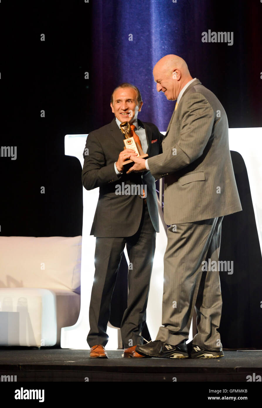 Las Vegas, Nevada, USA. 30th July, 2016. Ray 'Boom Boom' Mancini honored at the 4th Annual Nevada Boxing Hall of Fame Induction Ceremony standing with Rich Marotta, President of the NVBHOF Credit:  Ken Howard/Alamy Live News Stock Photo