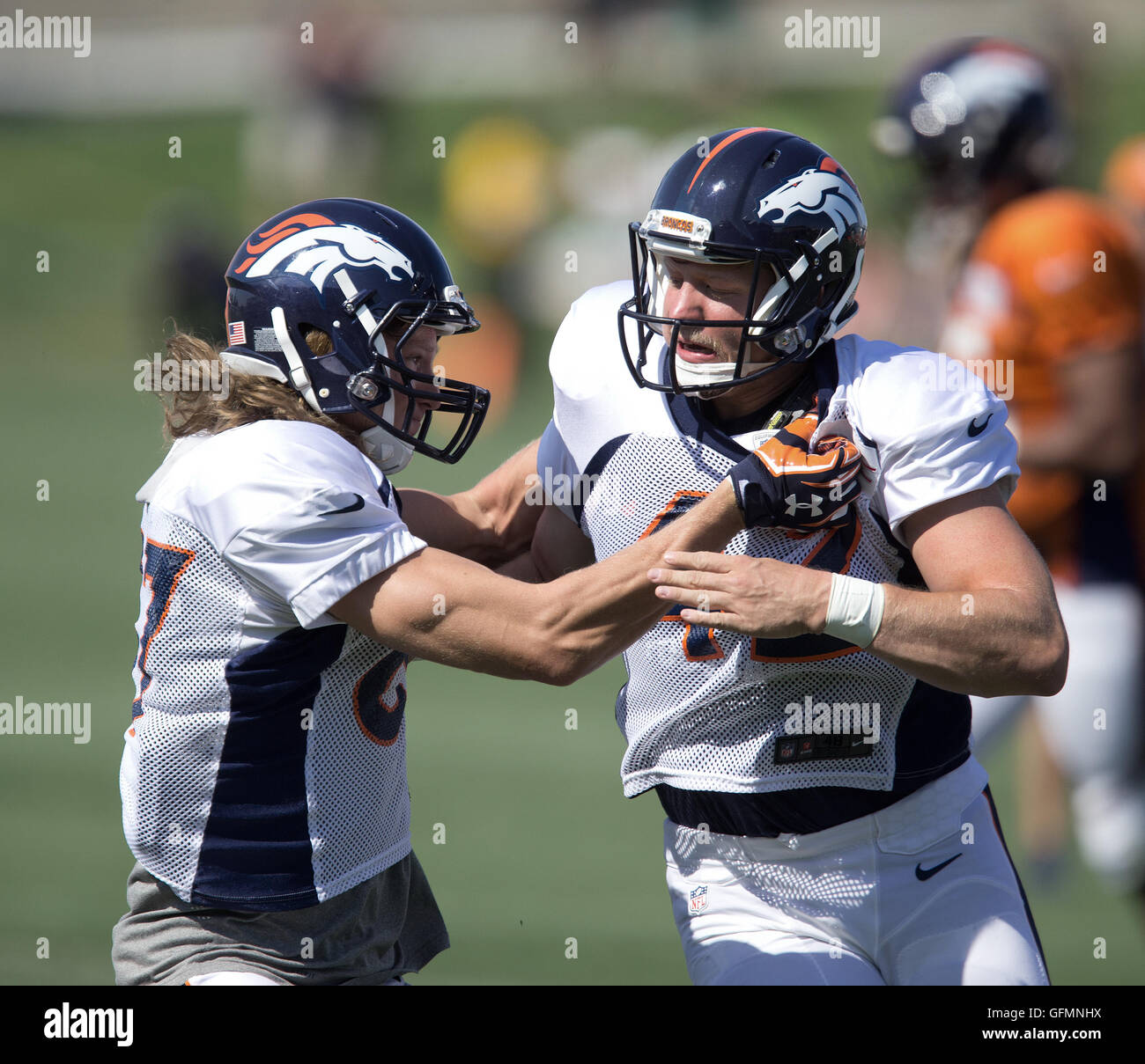 Englewood, Colorado, USA. 19th Aug, 2019. Broncos LS CASEY KREITER, left, K  BRANDON MC MANUS, center, and P COLBY WADMAN, right, yuk it up on the bench  during warm-ups Monday night at