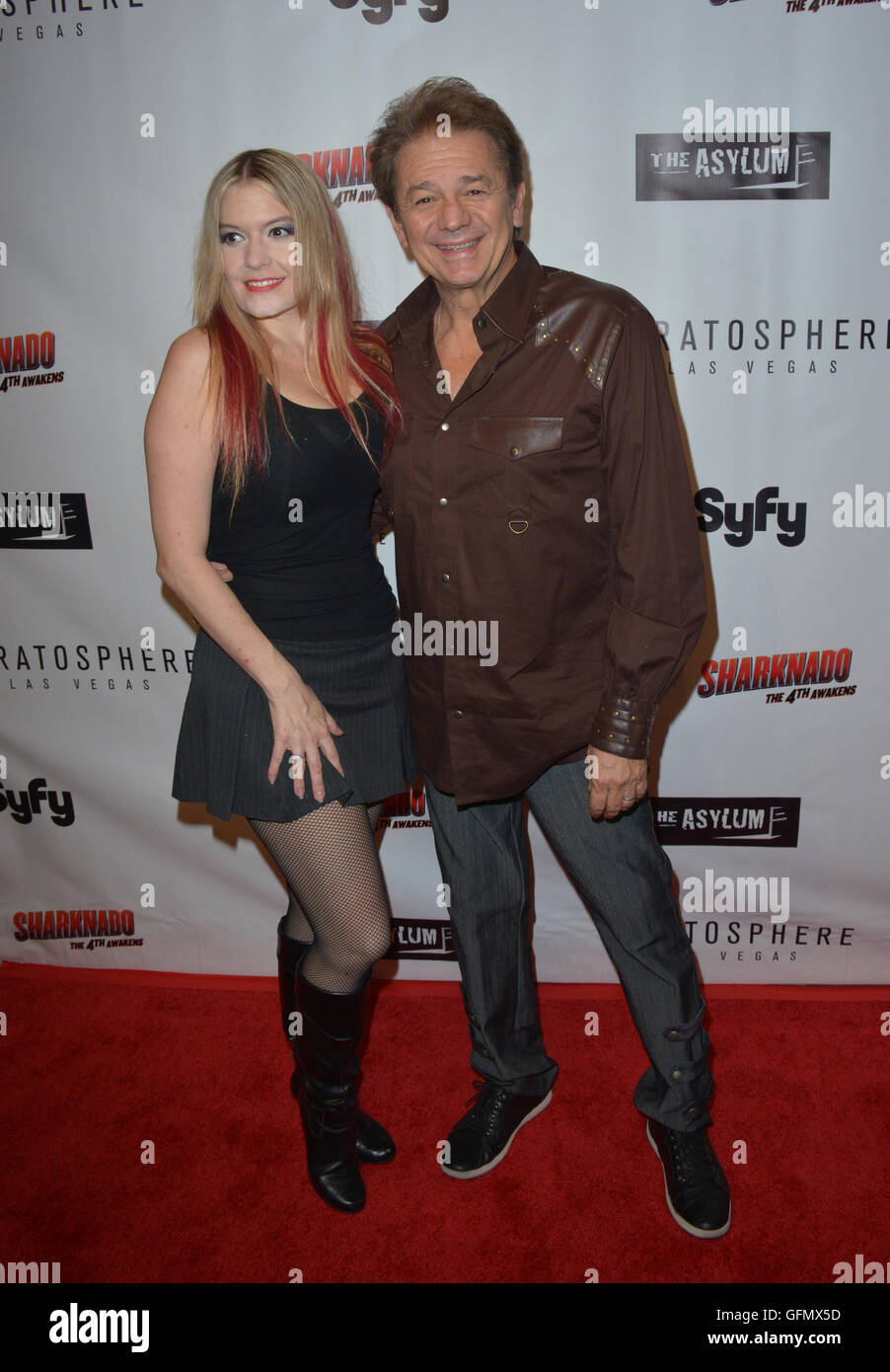 Las Vegas, Nevada, USA. 31st July, 2016. Actor Adrian Zmed and wife