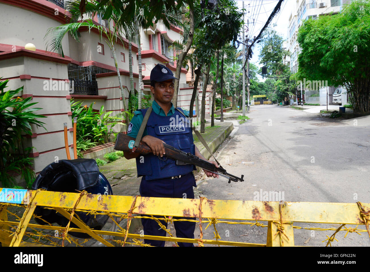 Dhaka, Bangladesh. 01st Aug, 2016. Bangladeshi policemen stand guard in front of Holey Artisan Bakery restaurant in Dhaka on August 1, 2016, in a street leading to the entrance of a Holey Artisan Bakery restaurant which was the site of a bloody siege that ended in the death of seventeen foreigners and five Bangladeshis on July 1. Credit:  Mamunur Rashid/Alamy Live News Stock Photo