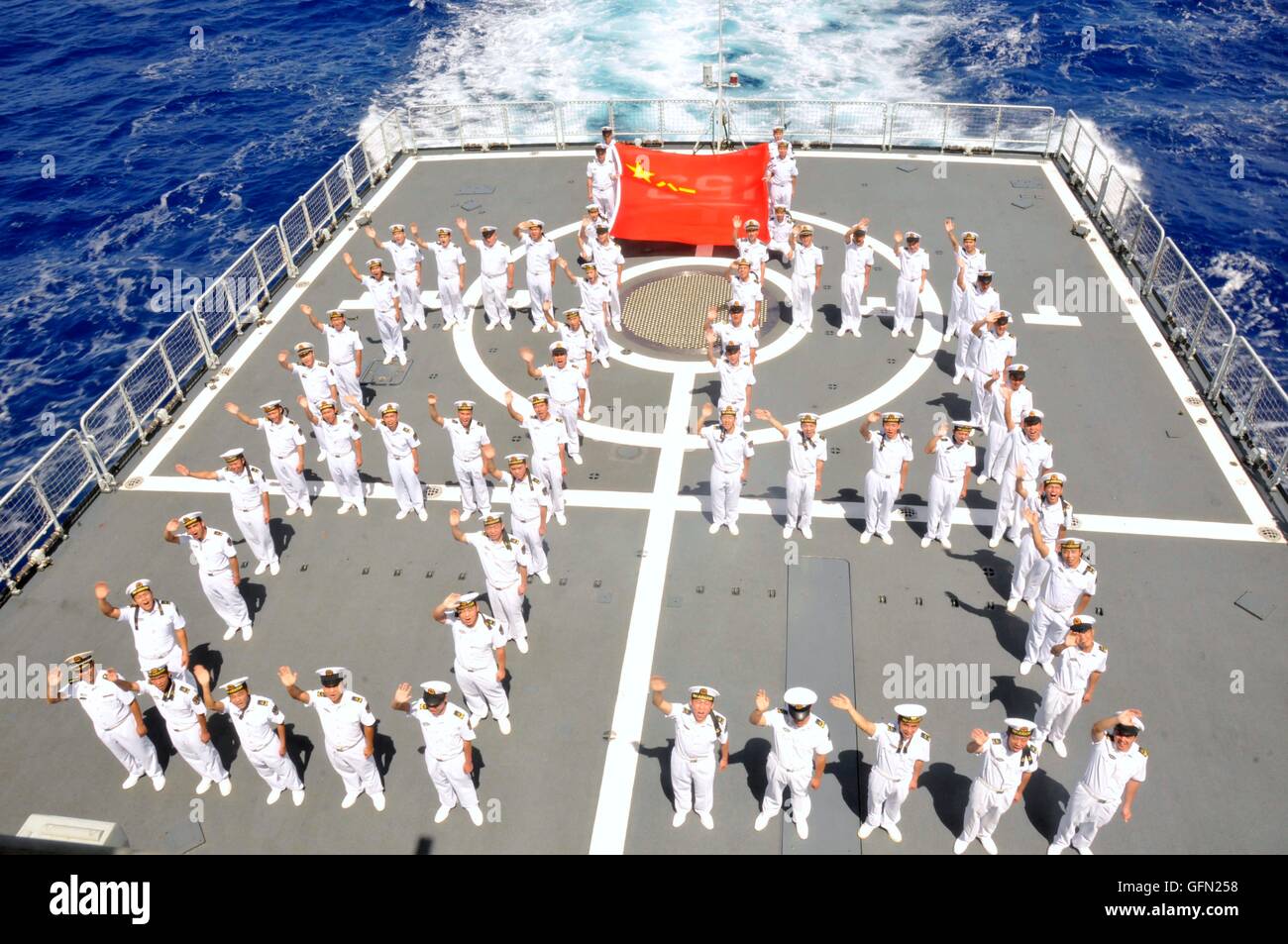 Aboard Xi'an. 1st Aug, 2016. Officers and soldiers line up to form the number '89' on Chinese missile destroyer Xi'an to celebrate the 89th anniversary of the establishment of the Chinese People's Liberation Army (PLA) at the Hawaiian sea area, on Aug. 1, 2016 Beijing time. A Chinese fleet participating in the Rim of the Pacific (RIMPAC) multinational naval exercises held activities to celebrate the 89th anniversary of the establishment of the PLA at the Hawaiian sea area. © Huang Yifang/Xinhua/Alamy Live News Stock Photo