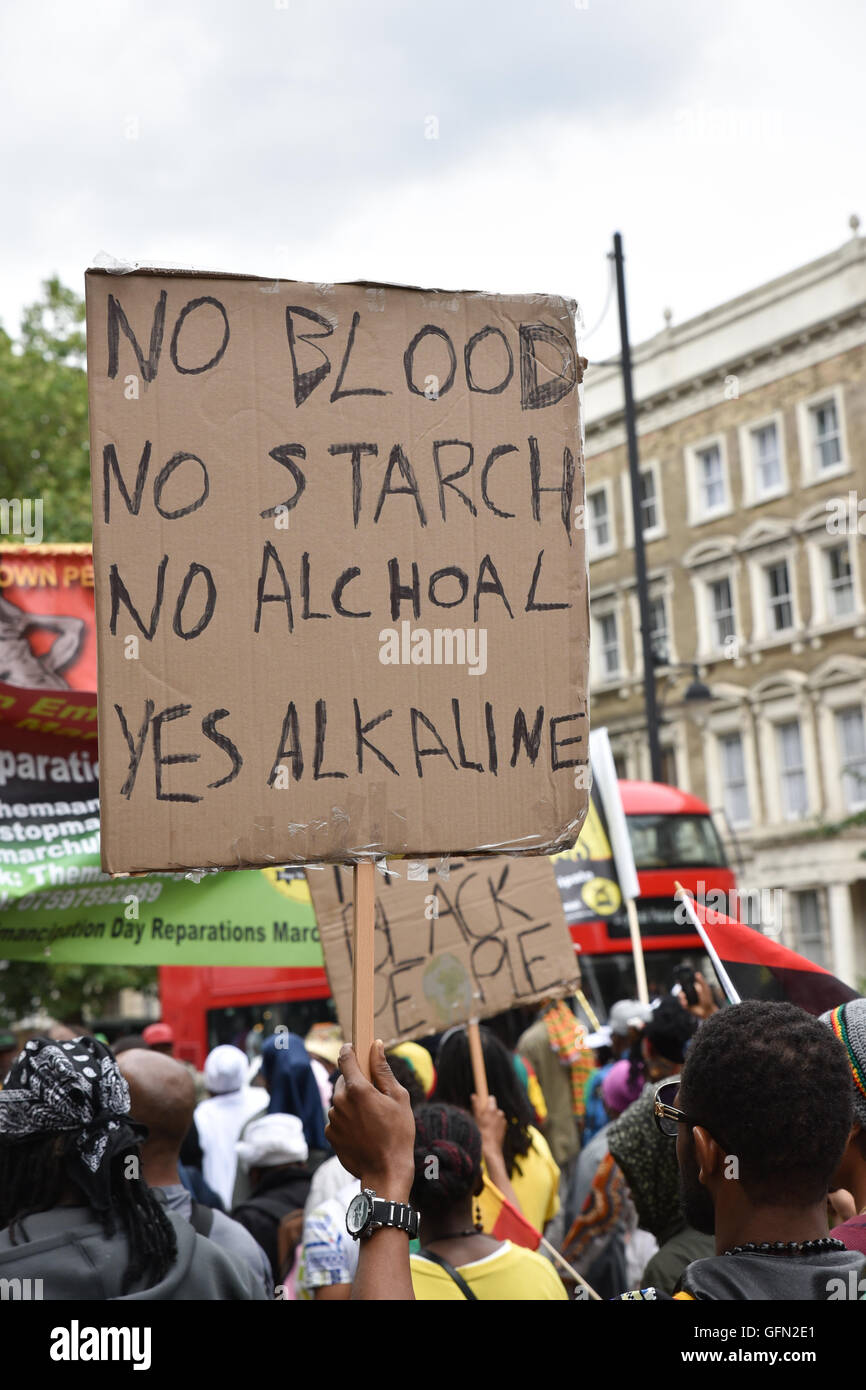 London, UK. 1st August 2016. African Emancipation Day march in central London. 'As well as demanding reparations Stock Photo