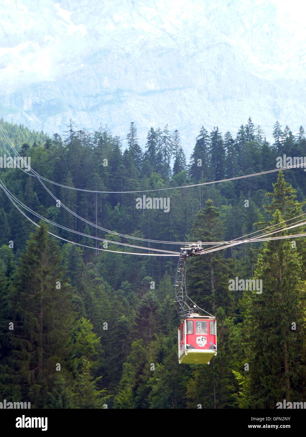 A carriage of the Eibsee cable car rides to the valley station at