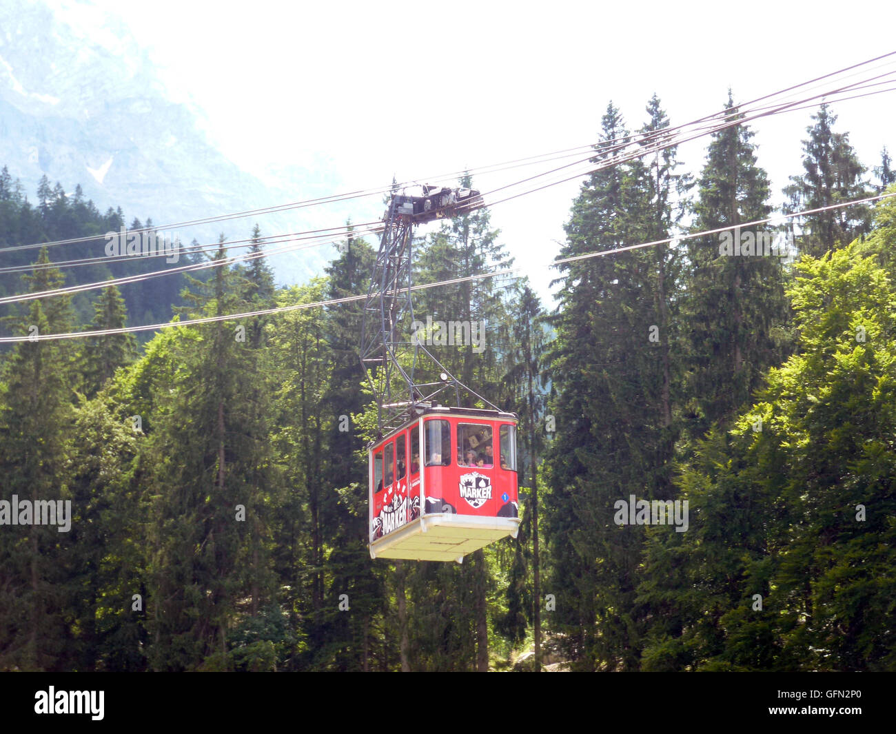 A carriage of the Eibsee cable car rides to the valley station at