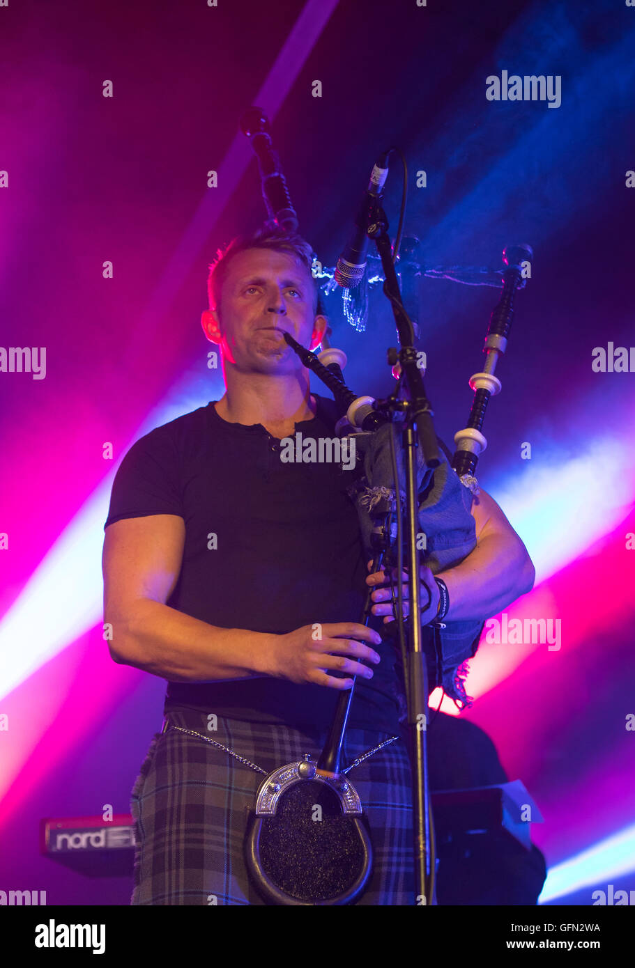 Piper, Aspy Luison, bagpipes, The Real McKenzies, Canadian Celtic punk band  in concert Stock Photo - Alamy