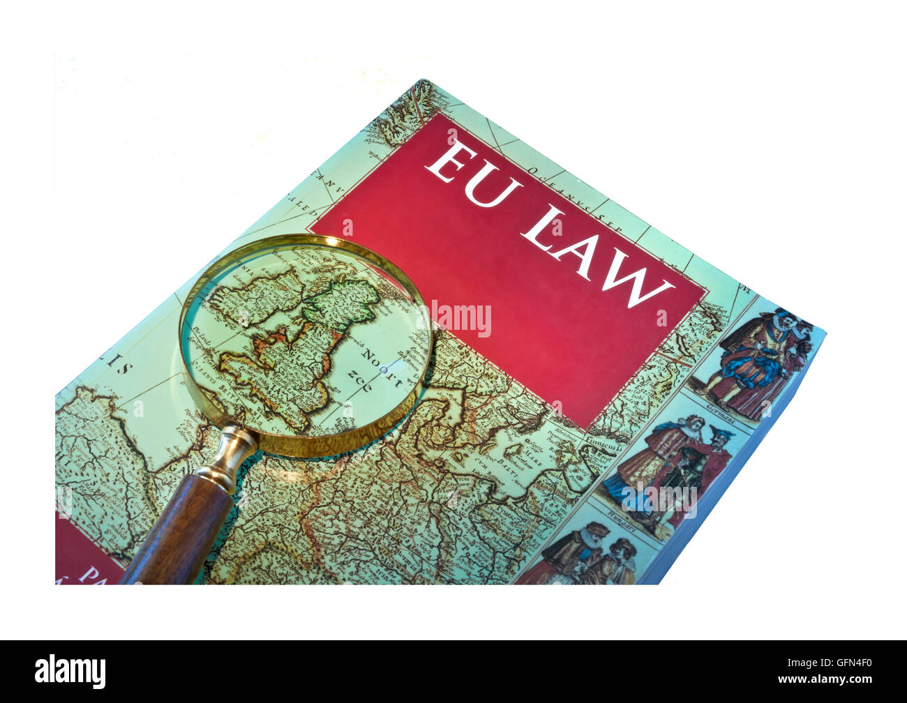 BREXIT UK MAP Concept image of EU Law book on desk with magnifying glass highlighting UK within map of Europe Stock Photo