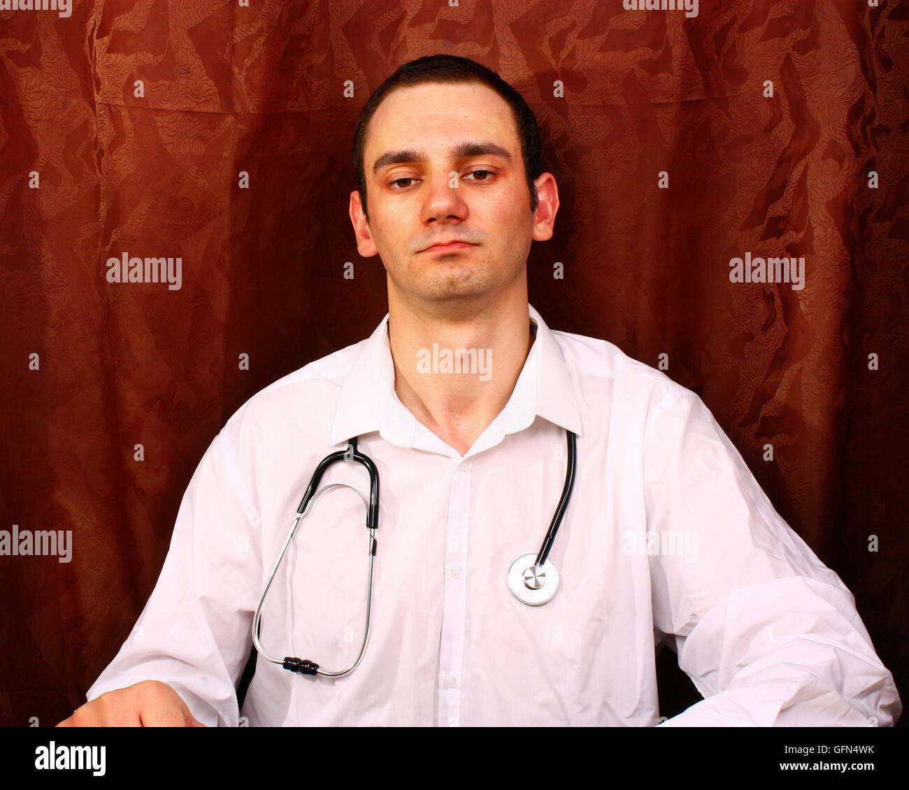 Young unshaven male doctor hi-res stock photography and images - Alamy