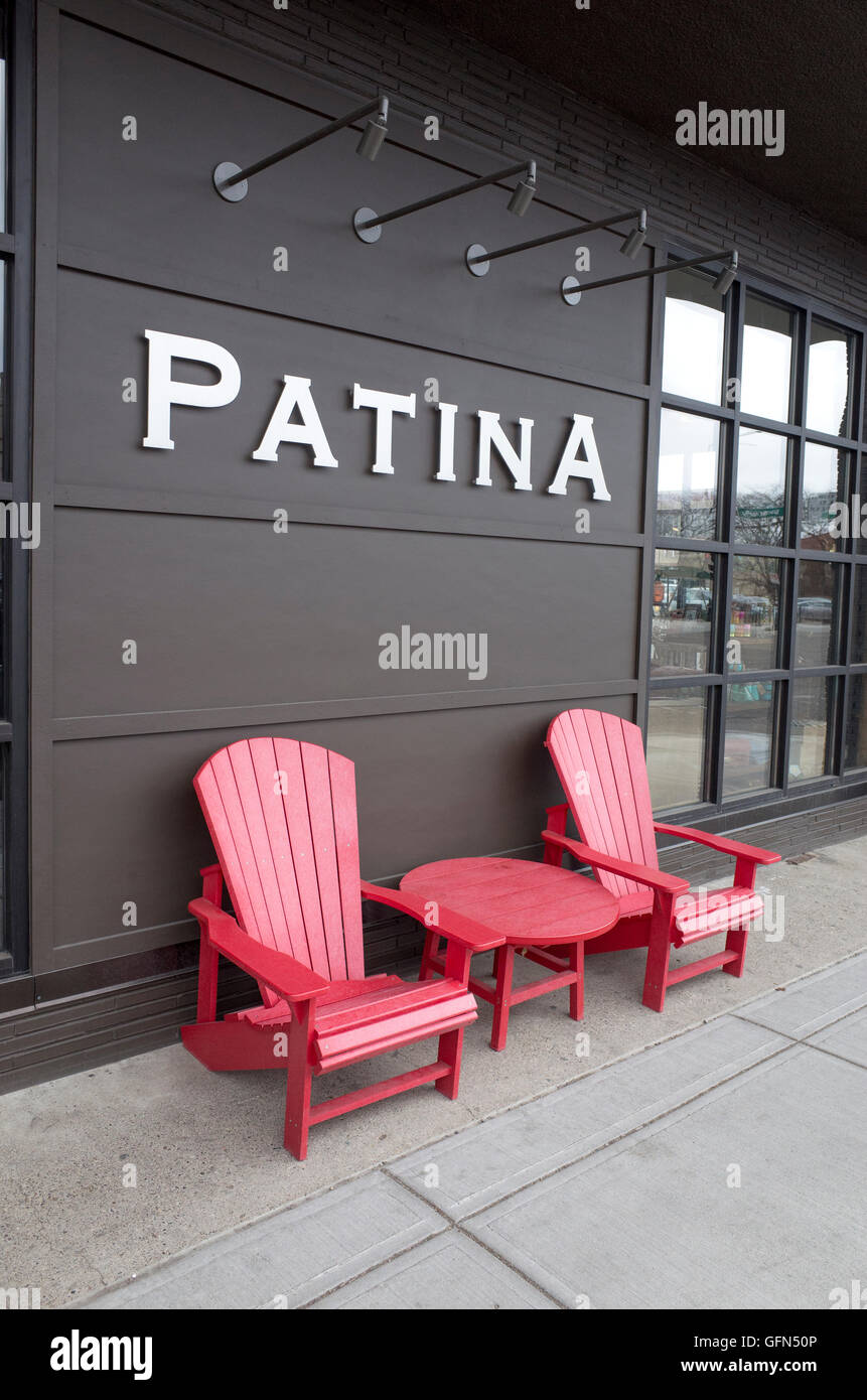 Pair of Adirondack chairs outside the Patina specialty shop purveyors of  home furnishings and gifts. St Paul Minnesota MN USA Stock Photo - Alamy