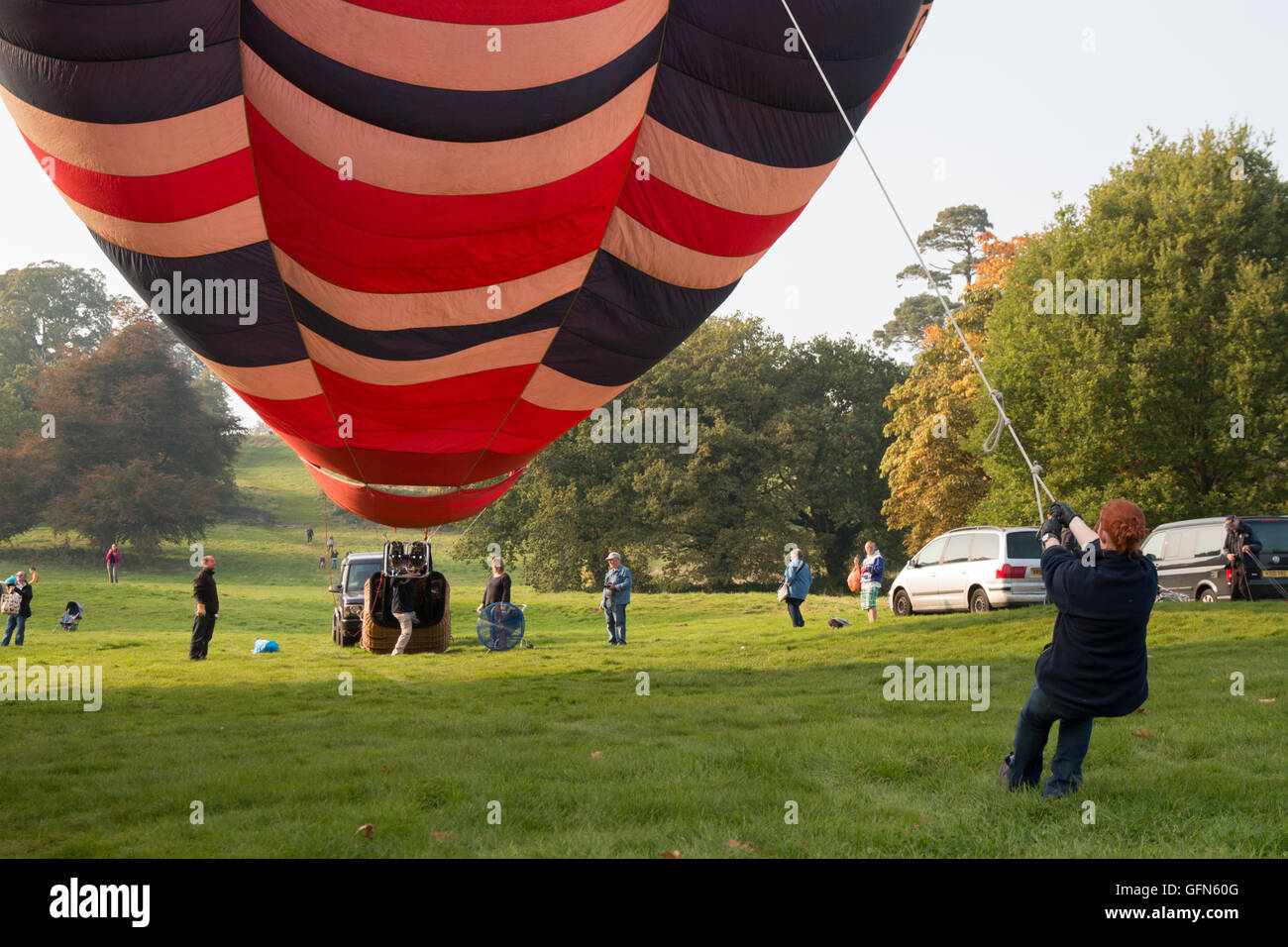 Crew inflating a hot air balloon in Bristol UK Stock Photo