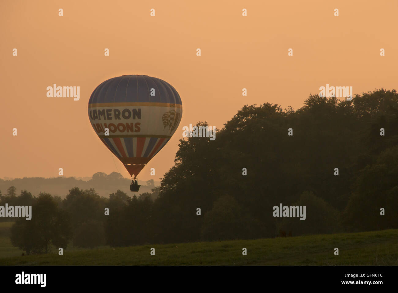 Ballloon in sunset Stock Photo - Alamy
