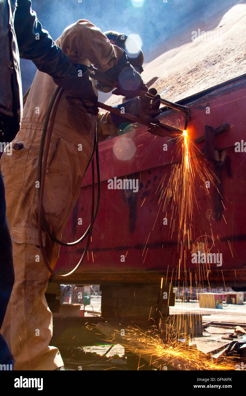 Man welding wearing protective clothes and equipment Stock Photo Alamy