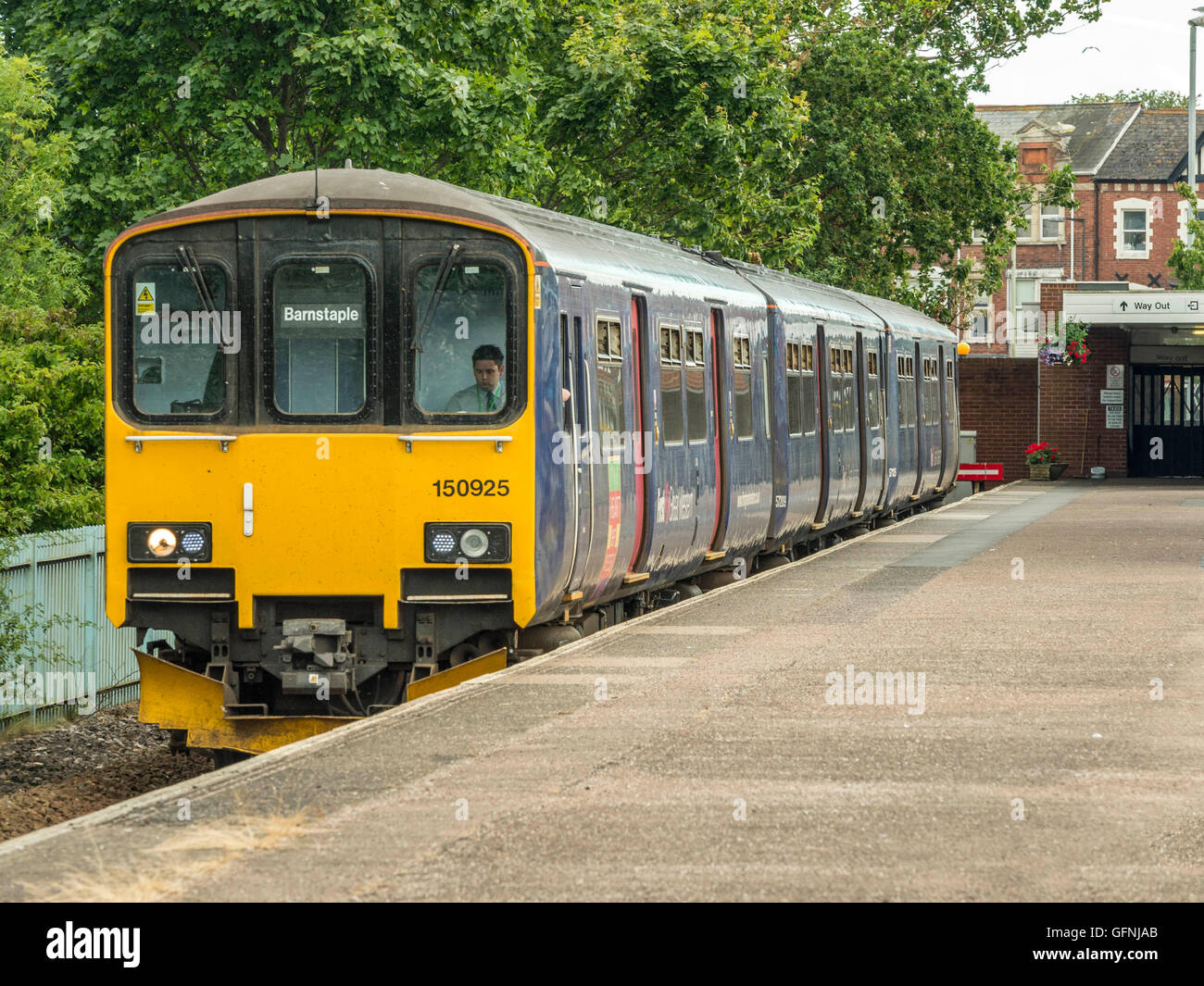 Great Western Train formed of three carriages waits at Exmouth Station bound for Barnstaple along the picturesque Avocet line. Stock Photo