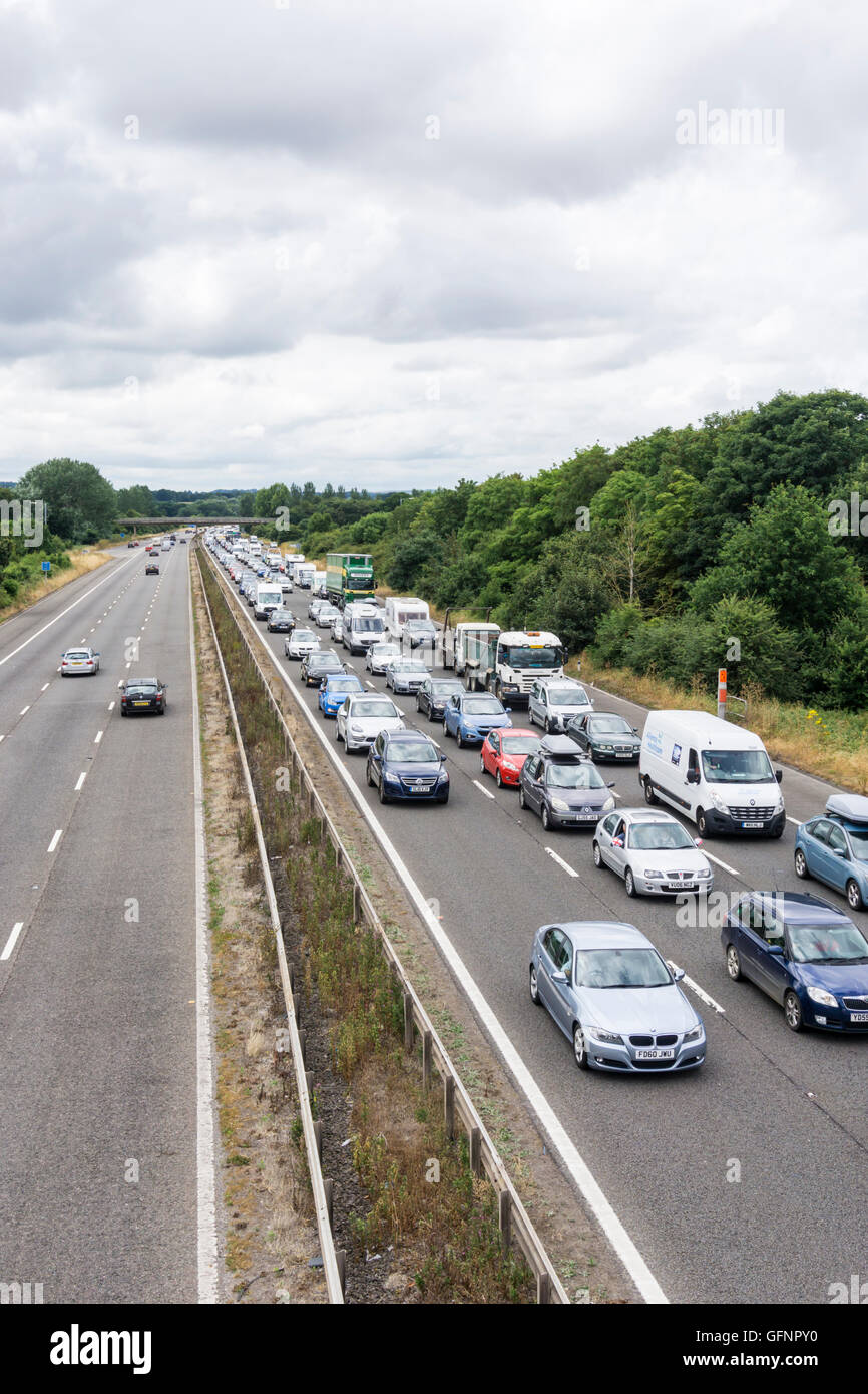 Traffic queuing on M5 leaving the West Country near Taunton. Probably mostly holiday traffic after 1st week of school holidays. Stock Photo