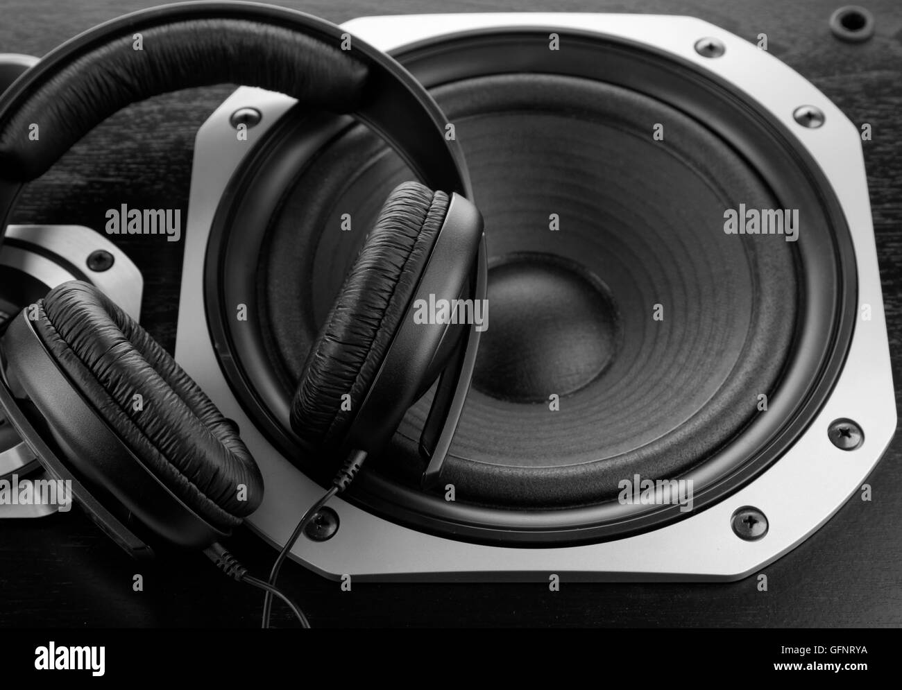Headphones on stereo speakers Stock Photo