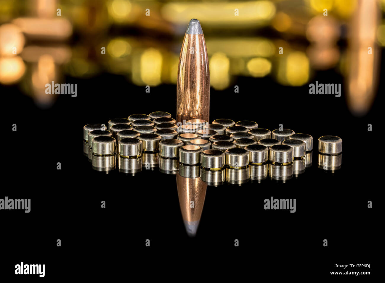 Bullets parts including primers and lead tipped copper rifle bullet Stock Photo