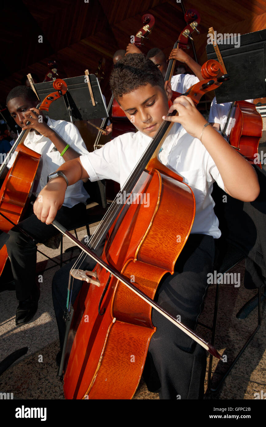 Young musicians playing with the Boston Landmarks Orchestra at the Hatch Shell, Boston, Massachusetts Stock Photo