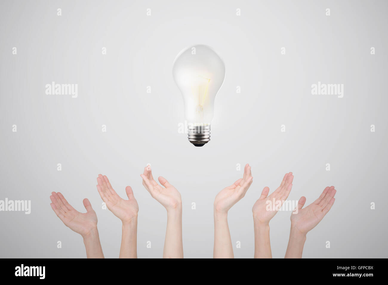 Hands with light bulb Stock Photo Alamy
