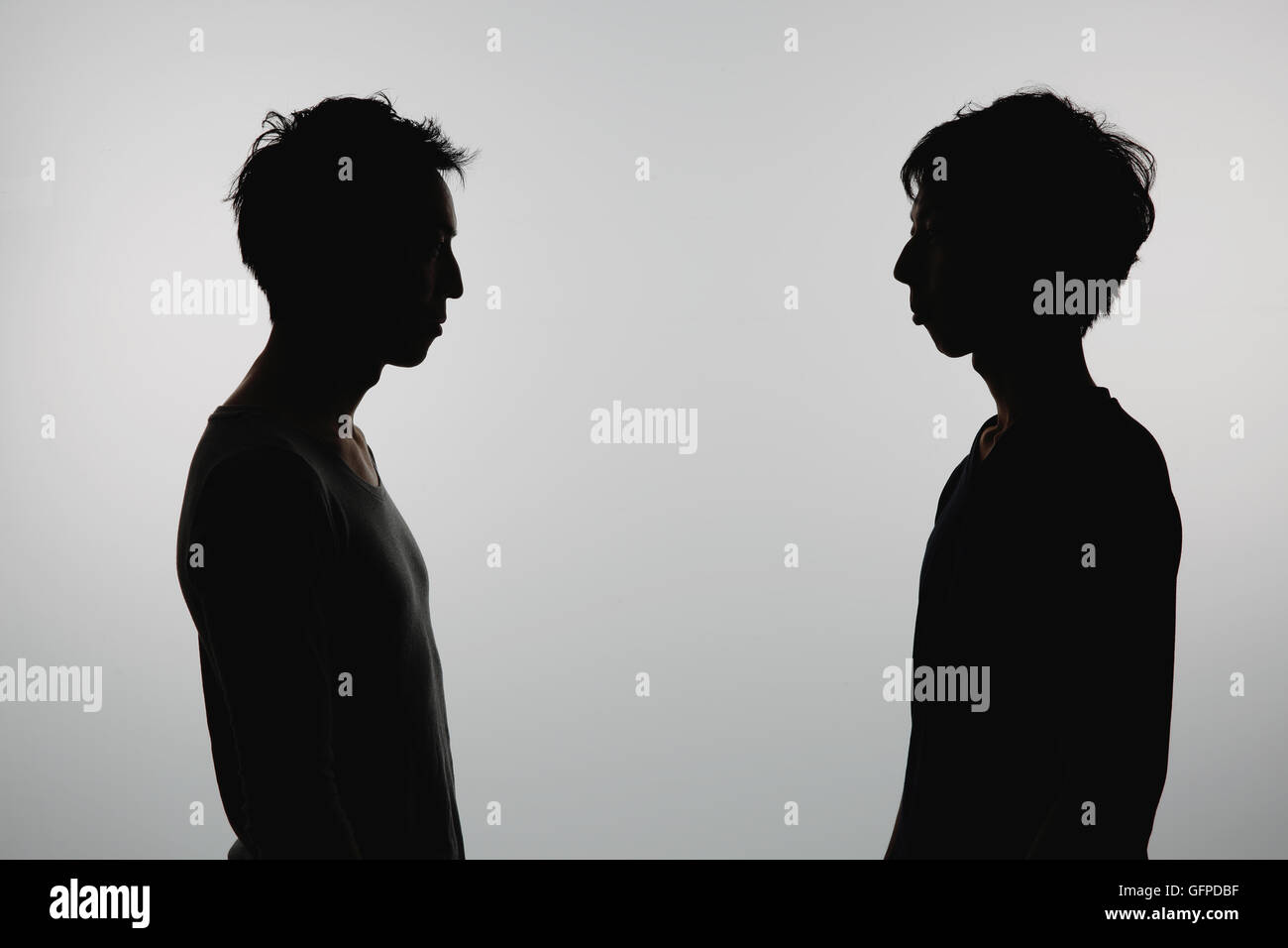 Male couple silhouette Stock Photo