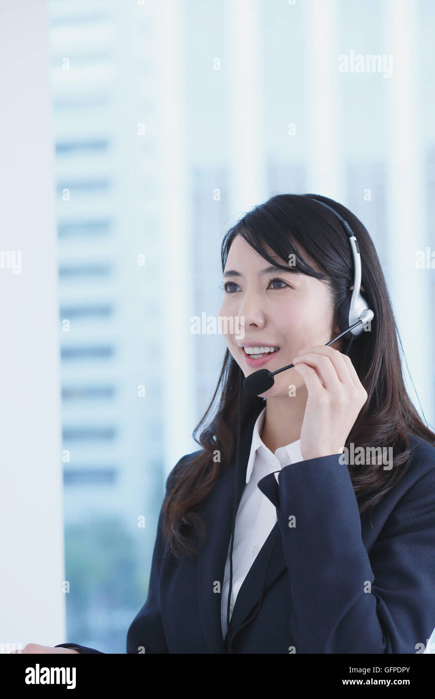 Japanese call center operator Stock Photo