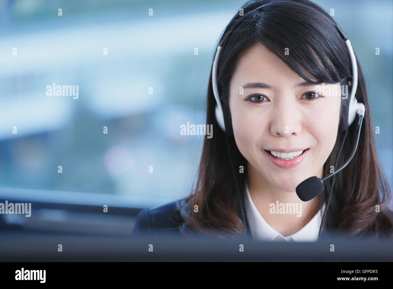 Japanese call center operator Stock Photo