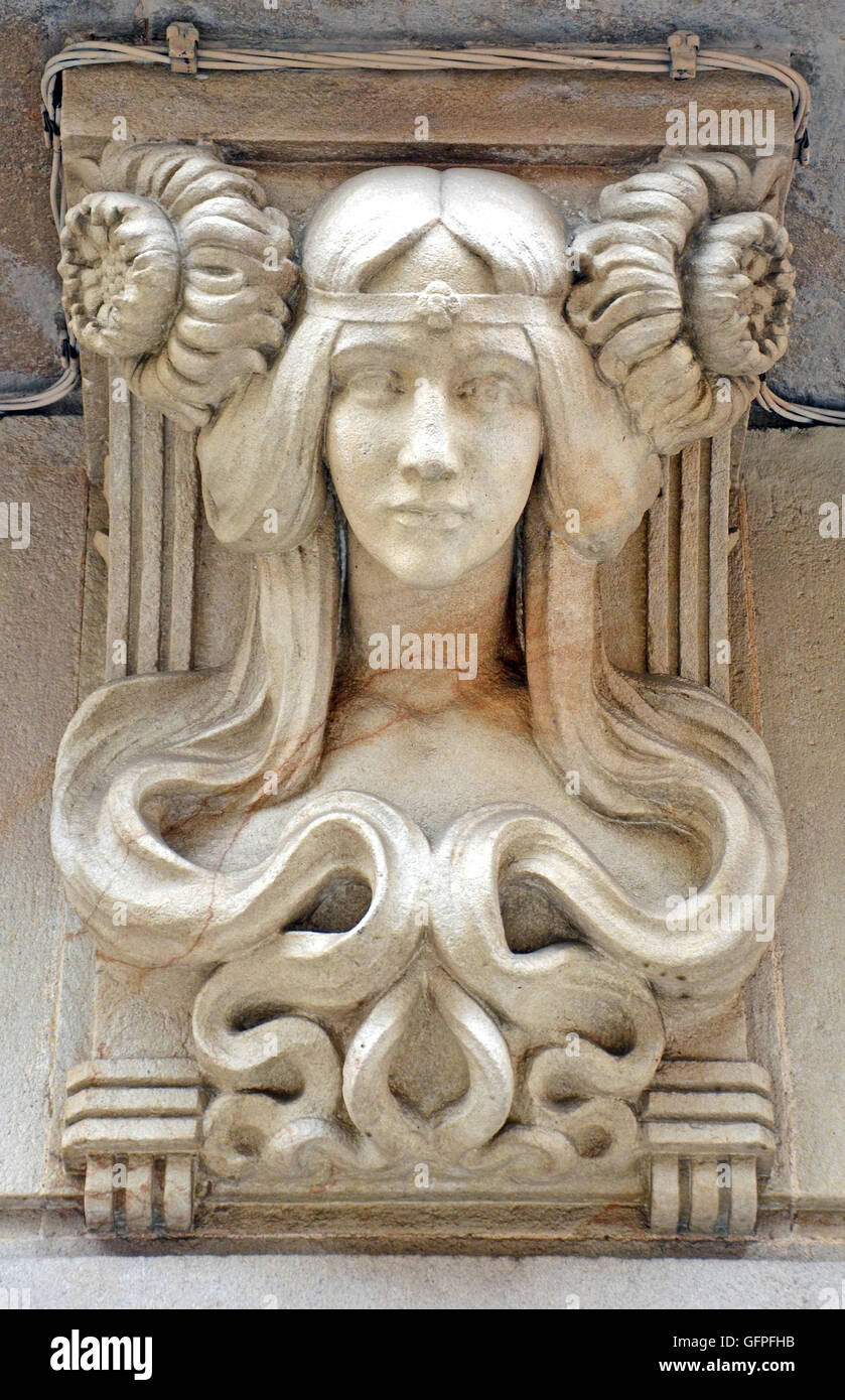Art Nouveau Female bust stone carving on outside of building, Barcelona, Spain. Example of German Art Nouveau jugendstil artisti Stock Photo