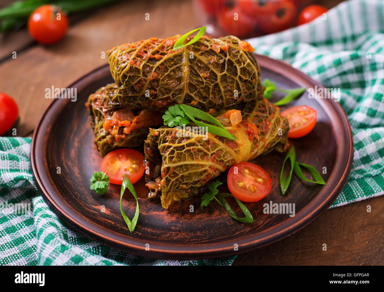 Stuffed savoy cabbage rolls in tomato sauce Stock Photo Alamy