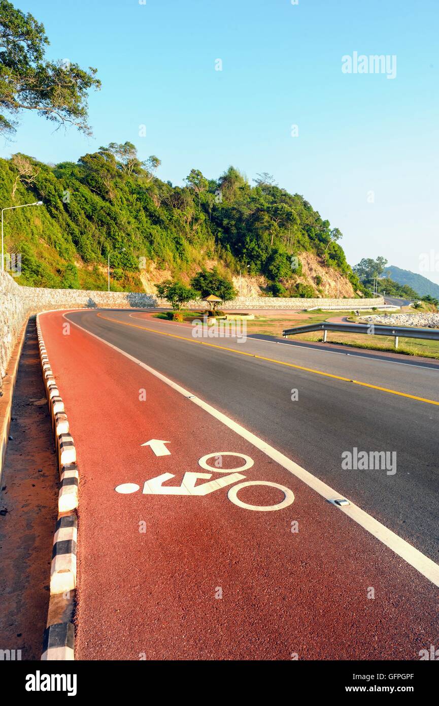 Bike lane in road beside the sea ,Nang Phaya View Point (Chalerm Burapa Chollathit Road),Chanthaburi, Thailand. Stock Photo
