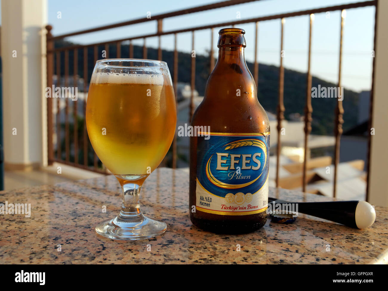 Bottle and glass of Efes Pilsen beer, Turkey. Stock Photo