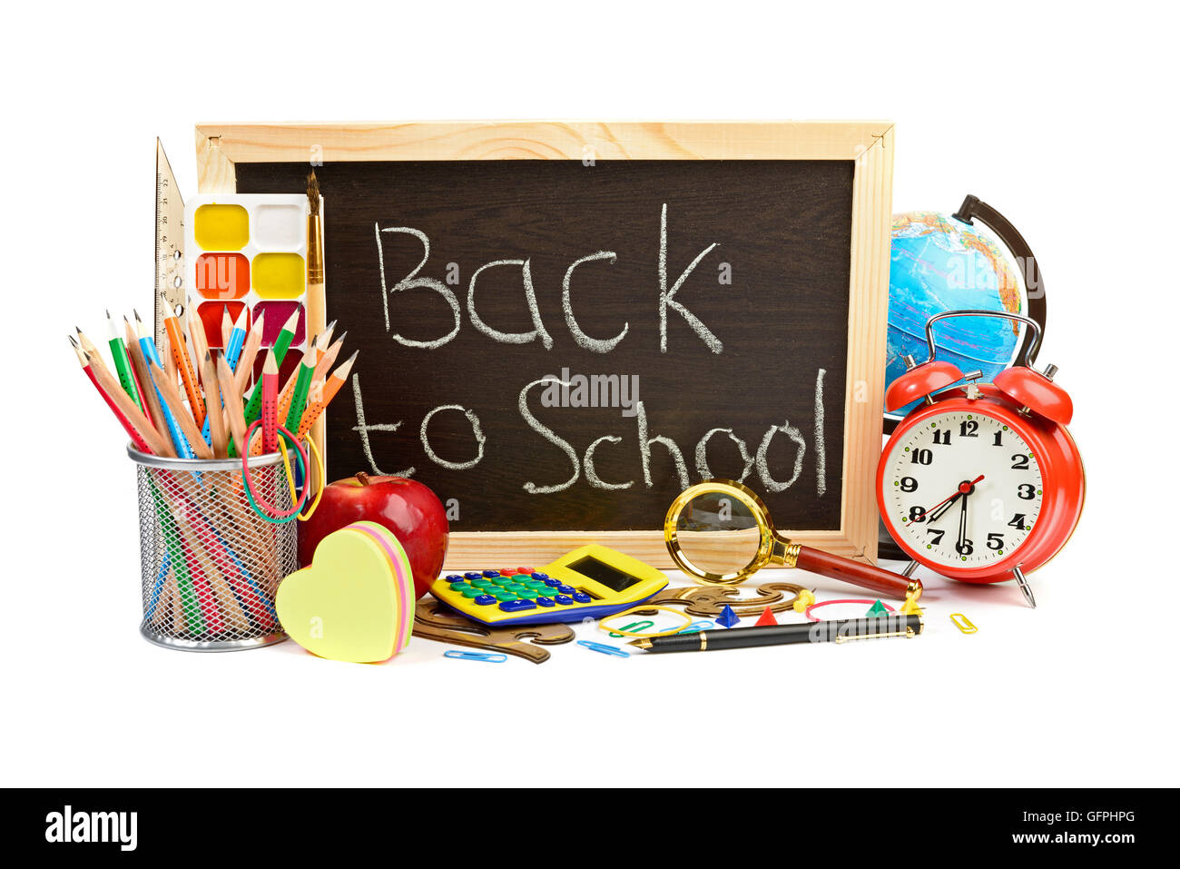Back to school supplies. Alarm clock and blackboard Stock Photo Alamy