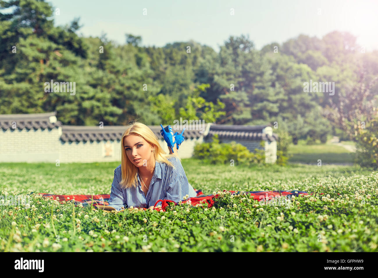 Girl relaxing at a park hi-res stock photography and images - Alamy