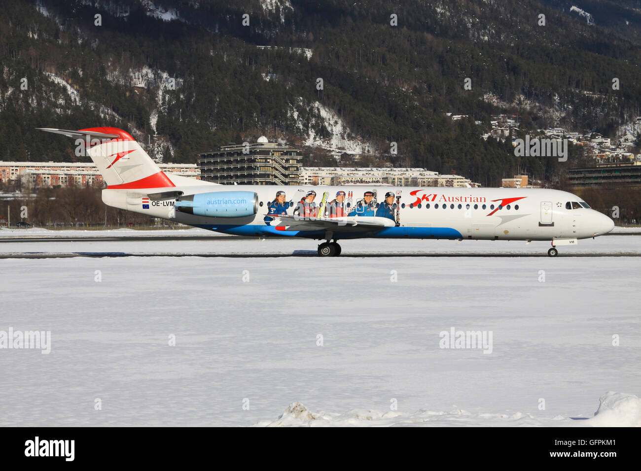 Innsbruck/Austria January 4, 2012: Fokker 70 from Austrian landing at Innsbruck Airport. Stock Photo