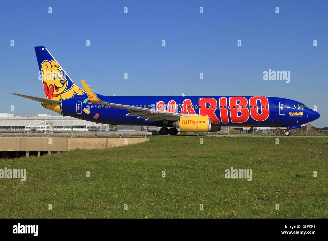 Munic/Germany September 22, 2012: Boeing 737 from Tuifly with Haribo livery ready to takeoff at MUNIC Airport. Stock Photo
