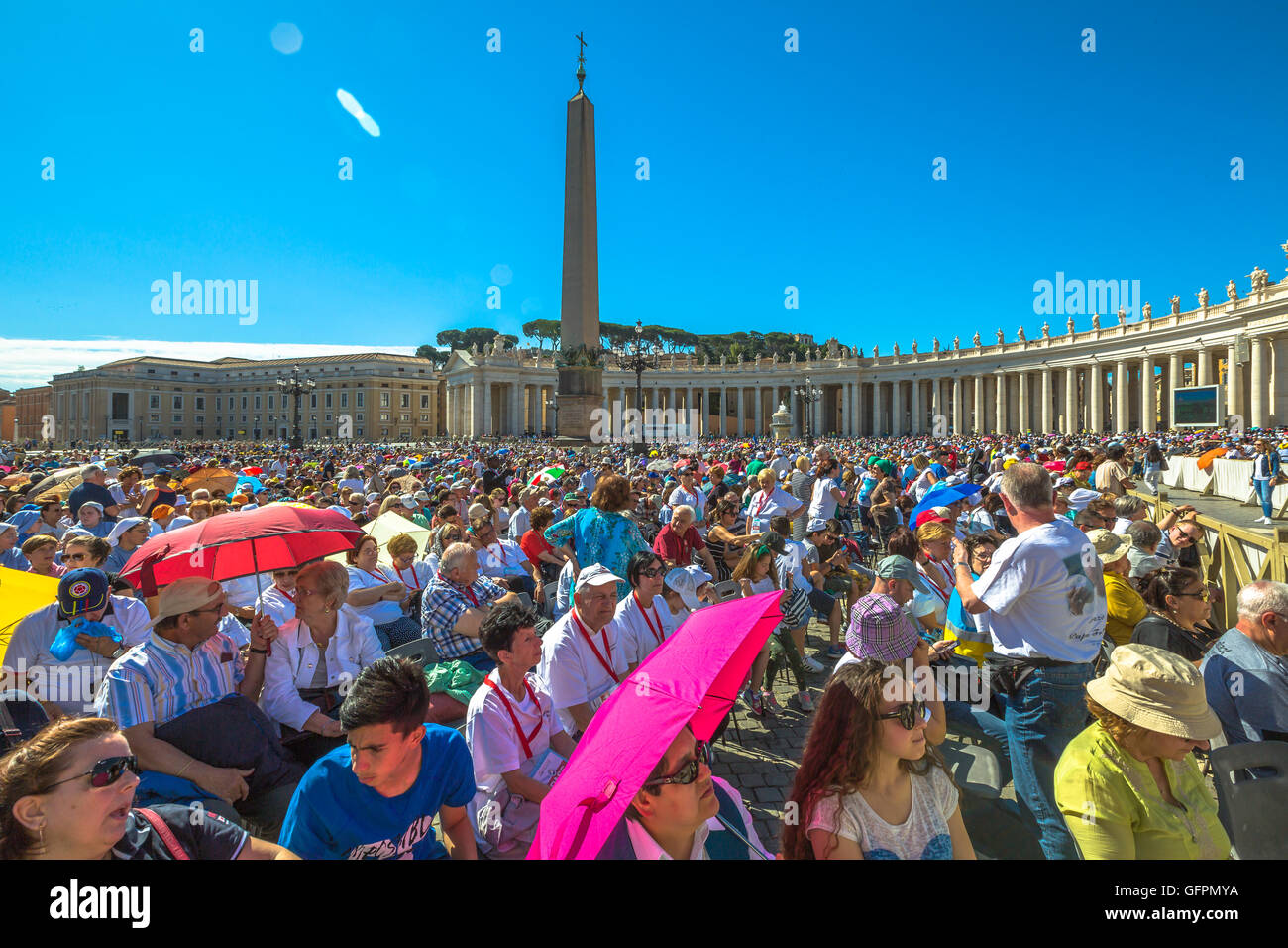 People in Piazza San Pietro Stock Photo