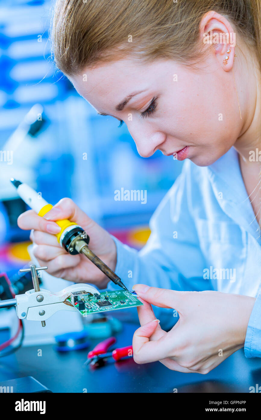 Soldering of electronic controller Stock Photo Alamy