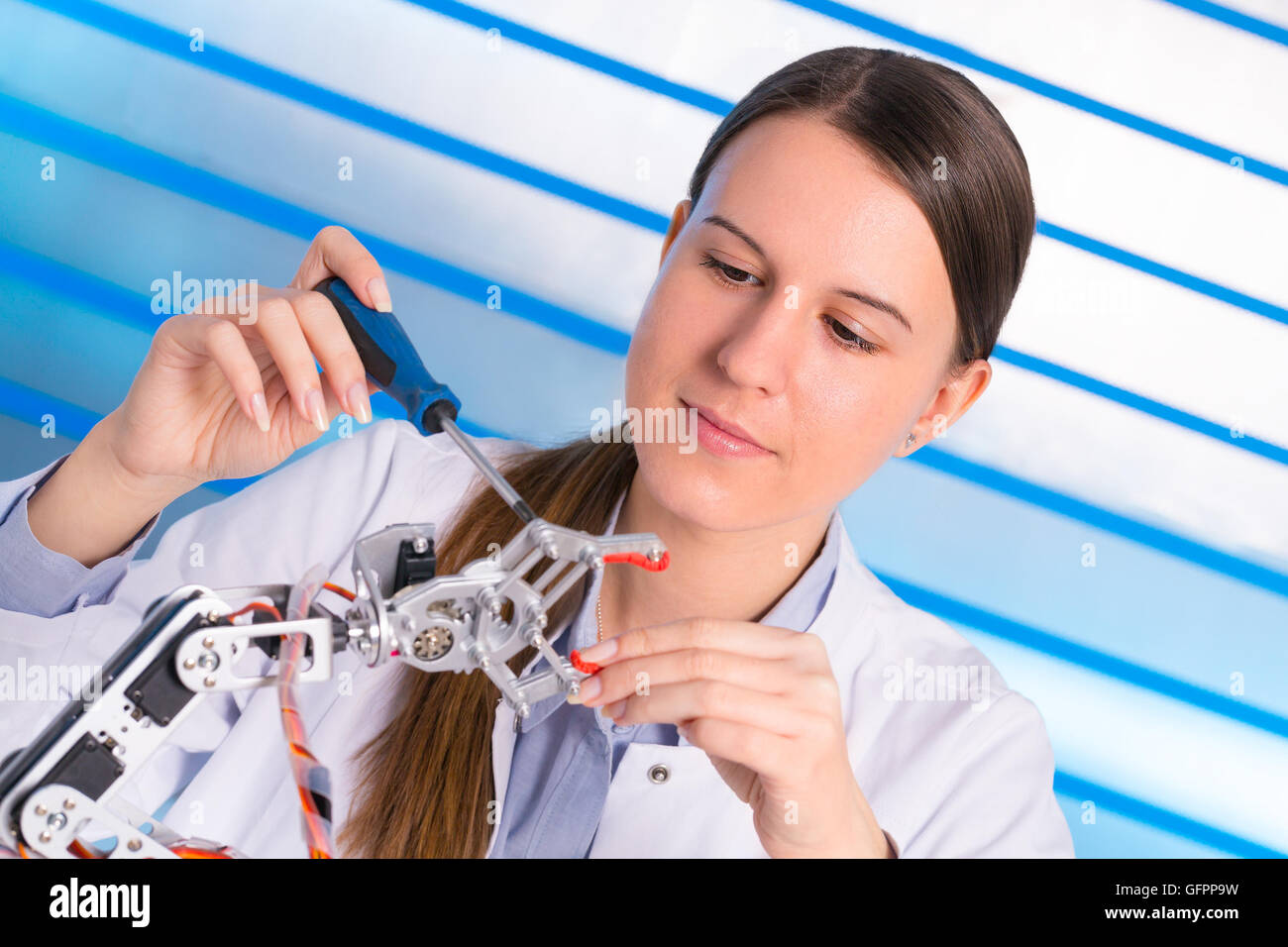 cientist develops Software for the robot arm Stock Photo Alamy