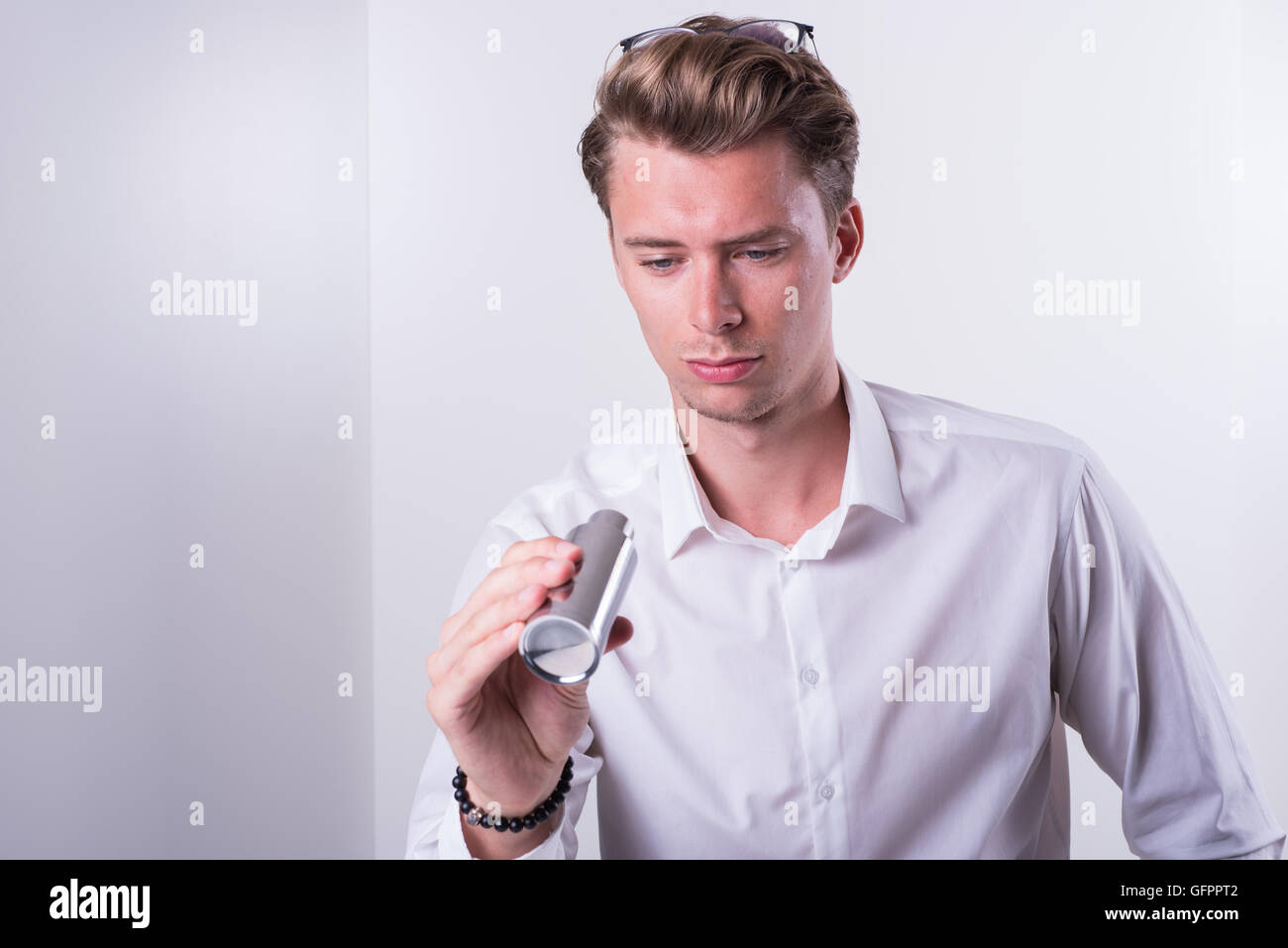young engineer is inspecting machine spare parts Stock Photo