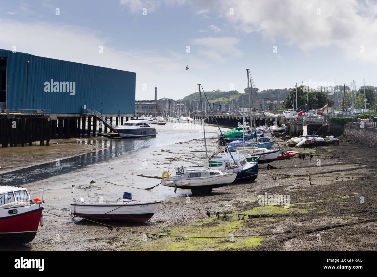 Low tide and beached boats at Stonehouse Creek, Plymouth, UK Stock Photo