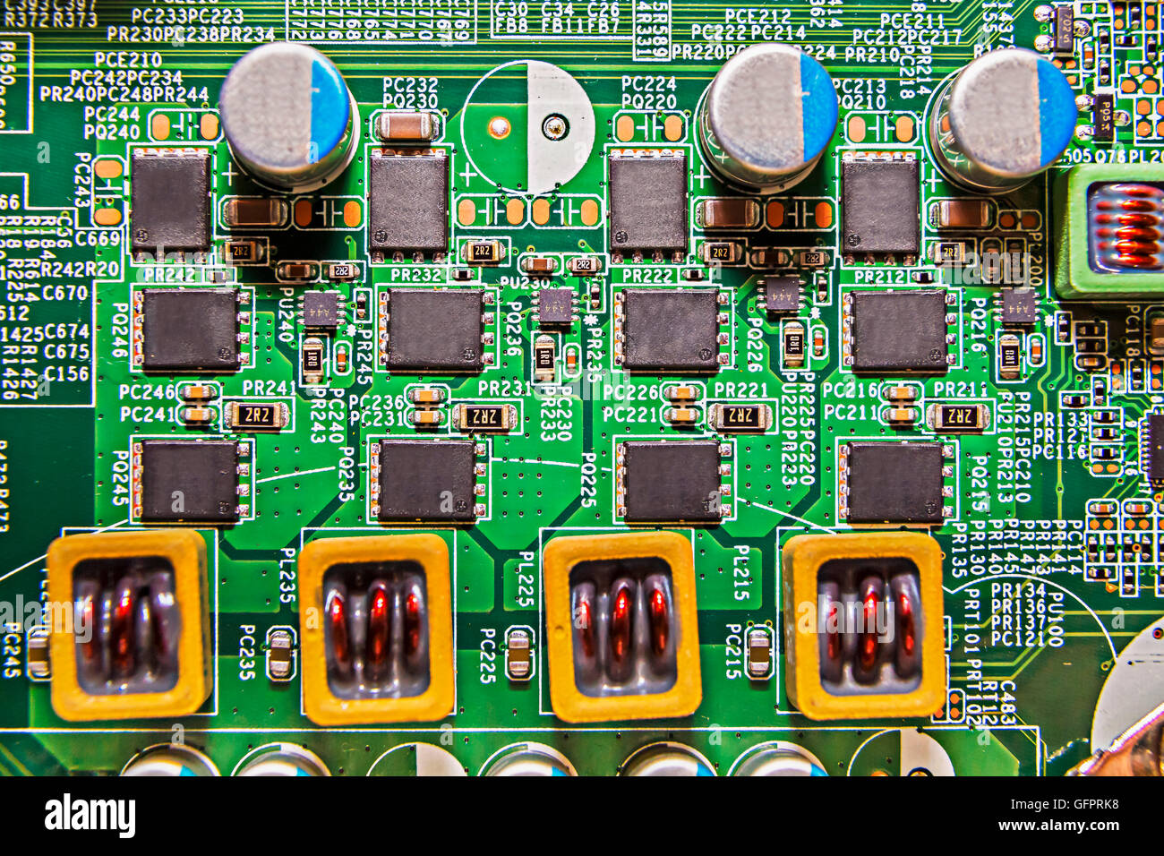 Top down shot of microchips and resistors on a circuit board, could represent the electronics industry Stock Photo