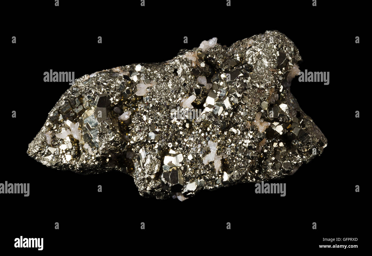 Pyrite on black background, also known as iron pyrite and fools gold, is an iron sulfide with the chemical formula FeS2. Stock Photo