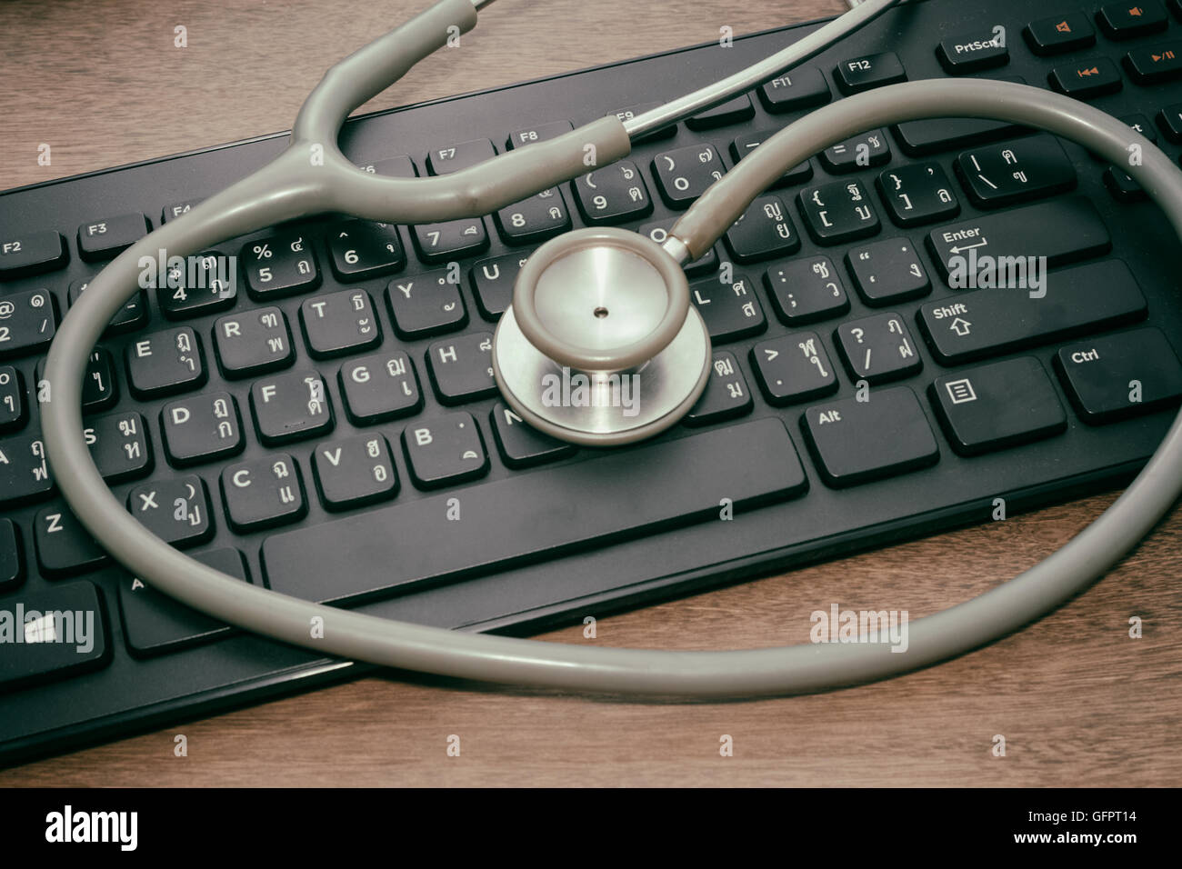 Stethoscope on the keyboard Stock Photo Alamy
