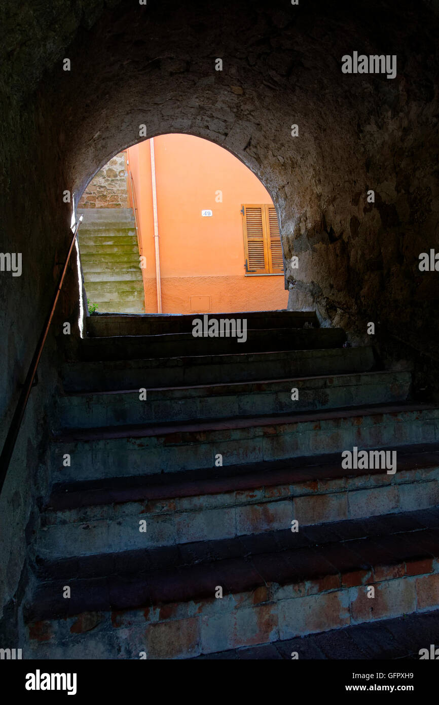 Stairway through tunnel to street, Cellere,  Province of Viterbo,  Latium, Italy Stock Photo