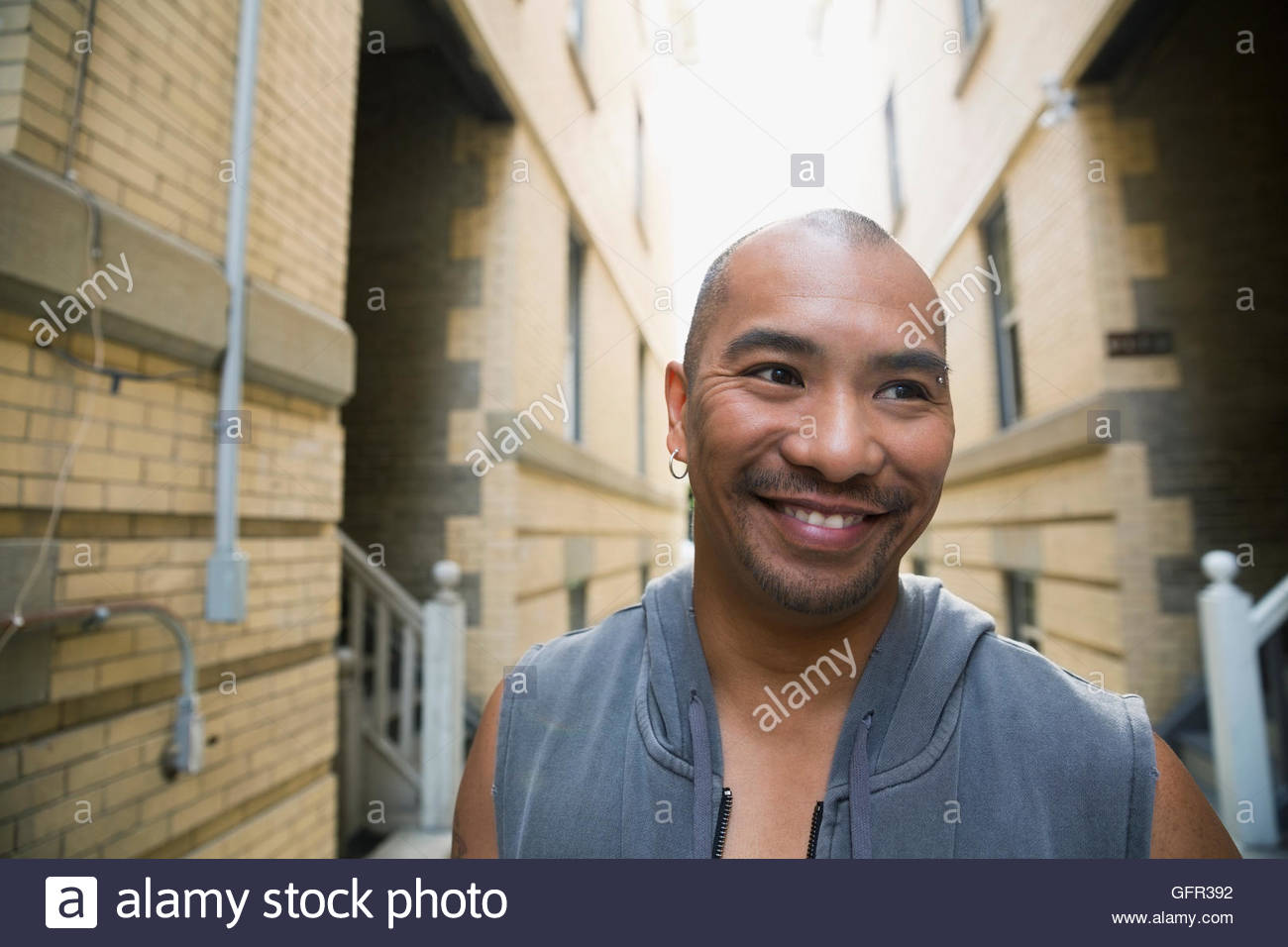 Man with shaved head hi-res stock photography and images - Alamy