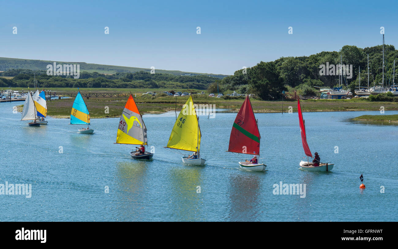 Dinghies sailing in the River Yar at Yarmouth, Isle of Wight, UK Stock