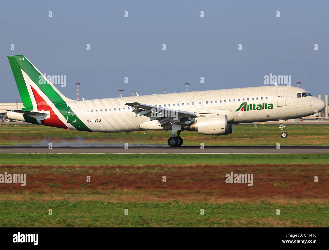 Malpensa/Italy Oktober 25, 2015: Aribus 320 from Air Alitalia landing at Malpensa Airport. Stock Photo