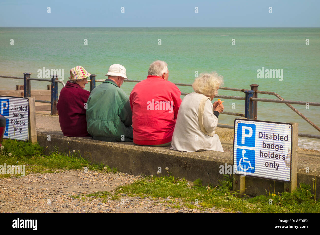 Pensioners Senior Citizens Enjoying View and Ice Cream Seaside St Margarets Bay Dover Stock Photo