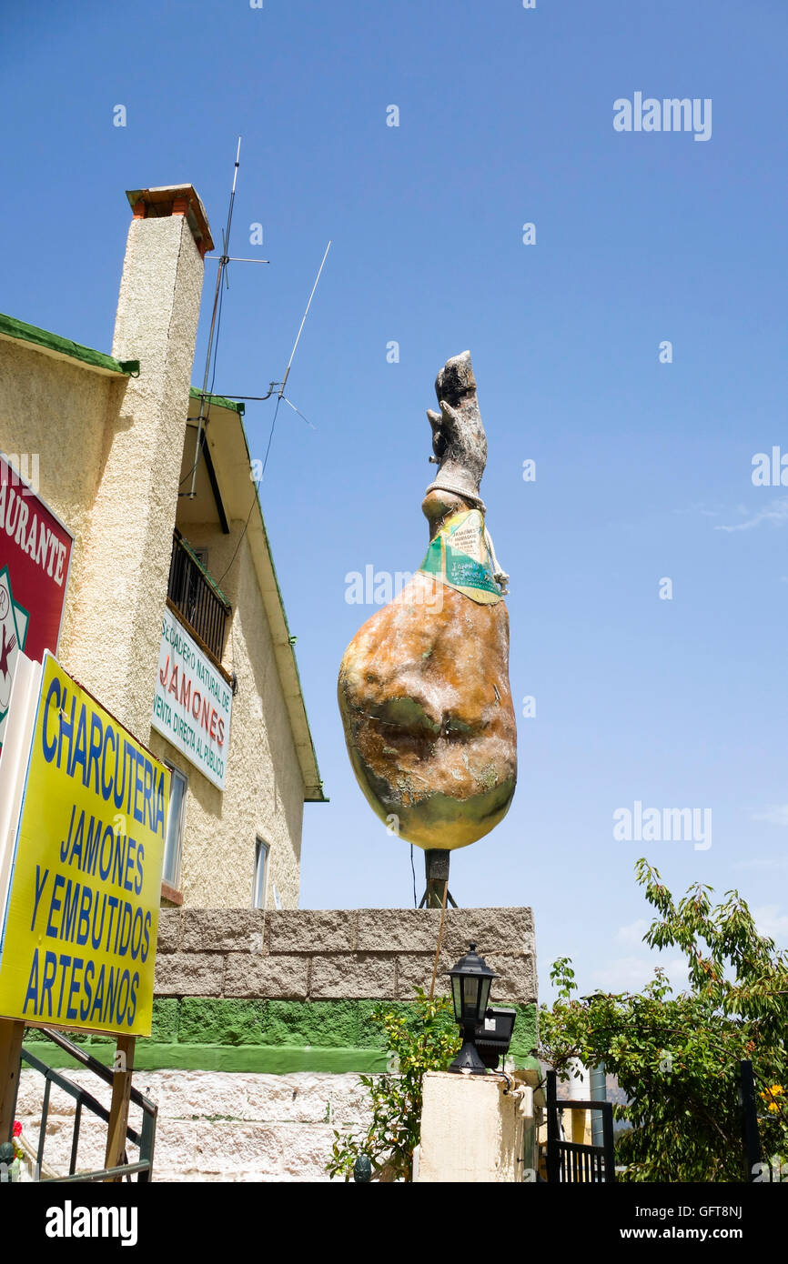Huge Plastic Ham displayed as advertising near restaurant, Sierra Nevada, Spain. Stock Photo
