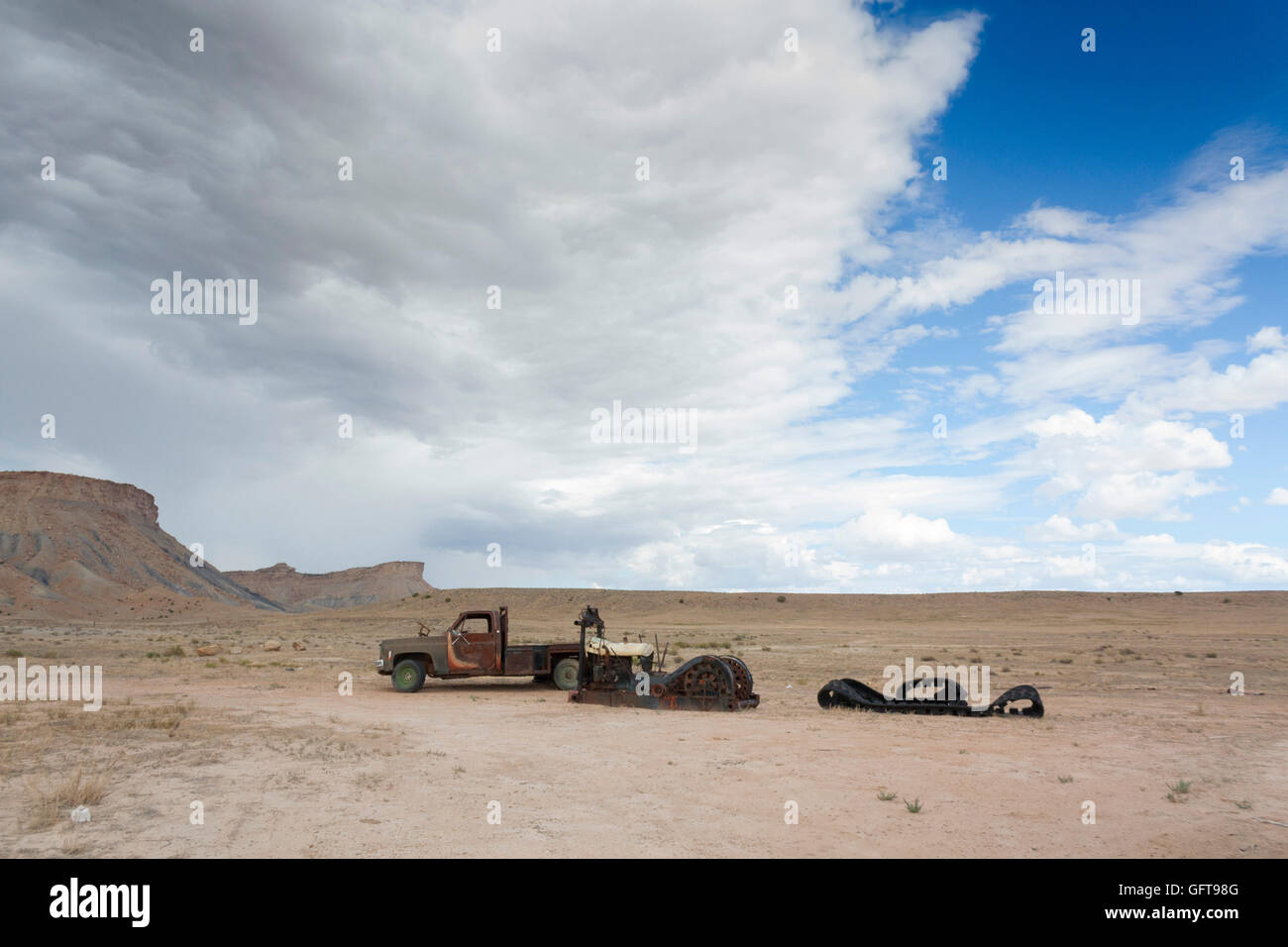 Old red flatbed truck abandoned in the Utah desert Stock Photo